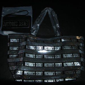 VICTORIA`S SECRET BLACK TOTE 22" W X 14" D WITH WRISTLET 9" W X 6" D